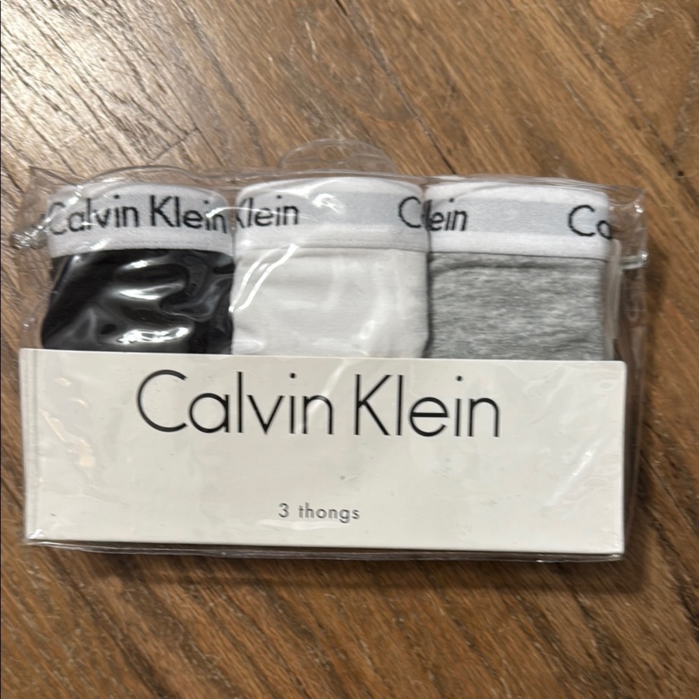 Calvin Klein Women's Thongs - Black, White, and Gray